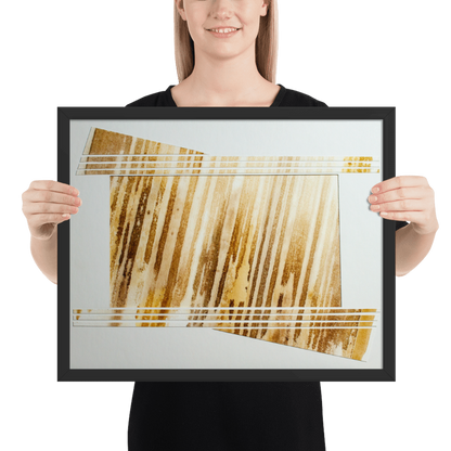 Elegant 16x20 abstract art piece titled 'Golden Stripe Abstract', showcasing bold chunks with gold and yellow stripes, framed in black, adding a luxurious and modern touch to any room. with a female model holding the print black frame