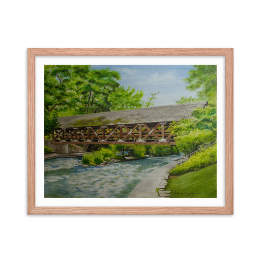 Watercolor print of the Naperville Riverwalk Covered Bridge in summer, showcasing its historic charm and serene setting along the DuPage River in vibrant colors. Wood Frame 16x20